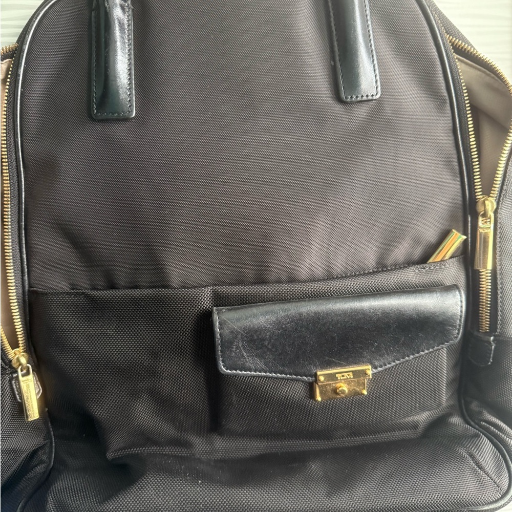 Tumi Black and Gold Backpack